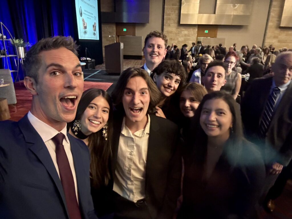After the ceremony, recipient of the Damon Runyon award Ari Shapiro poses for a selfie with CU students and alumni. From left to right: Ari Shapiro, Ethel Yagudayeva, John Meylor, Lincoln Roch, Ann Marie Vanderveen, Ainsley Coogan, Jack Armstrong, Juanita Hurtado Huerfano. 